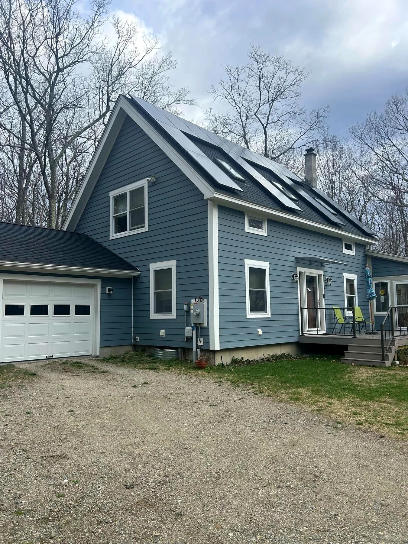 Blue home exterior painting project